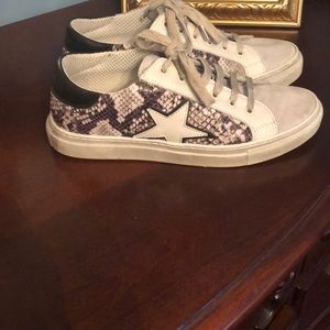 Dylan Skye star sneakers.  Sold at The Shoe Box